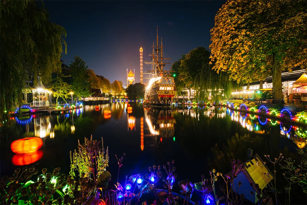 top 20 best things to do in Copenhagen - Colourful Tivoli Gardens in Copenhagen at night