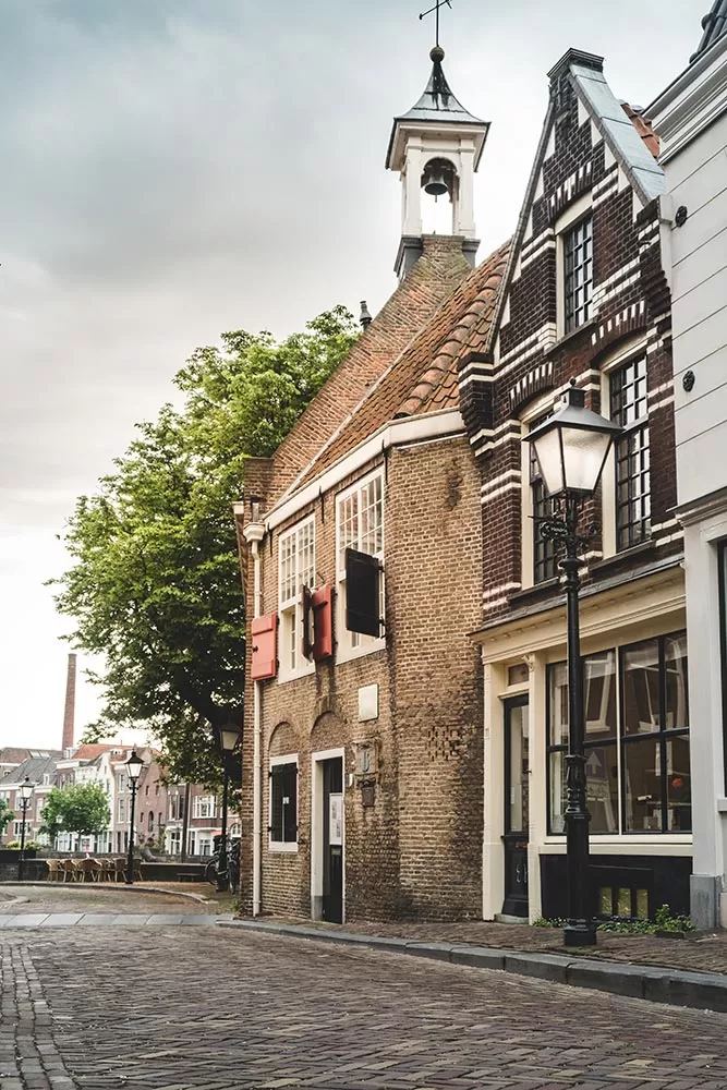 best things to do in rotterdam in 2021 - street in delfshaven district