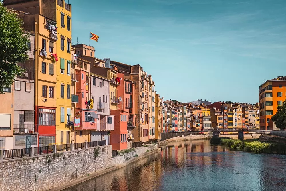 Best things to do in Costa Brava - girona coloured houses river onyar
