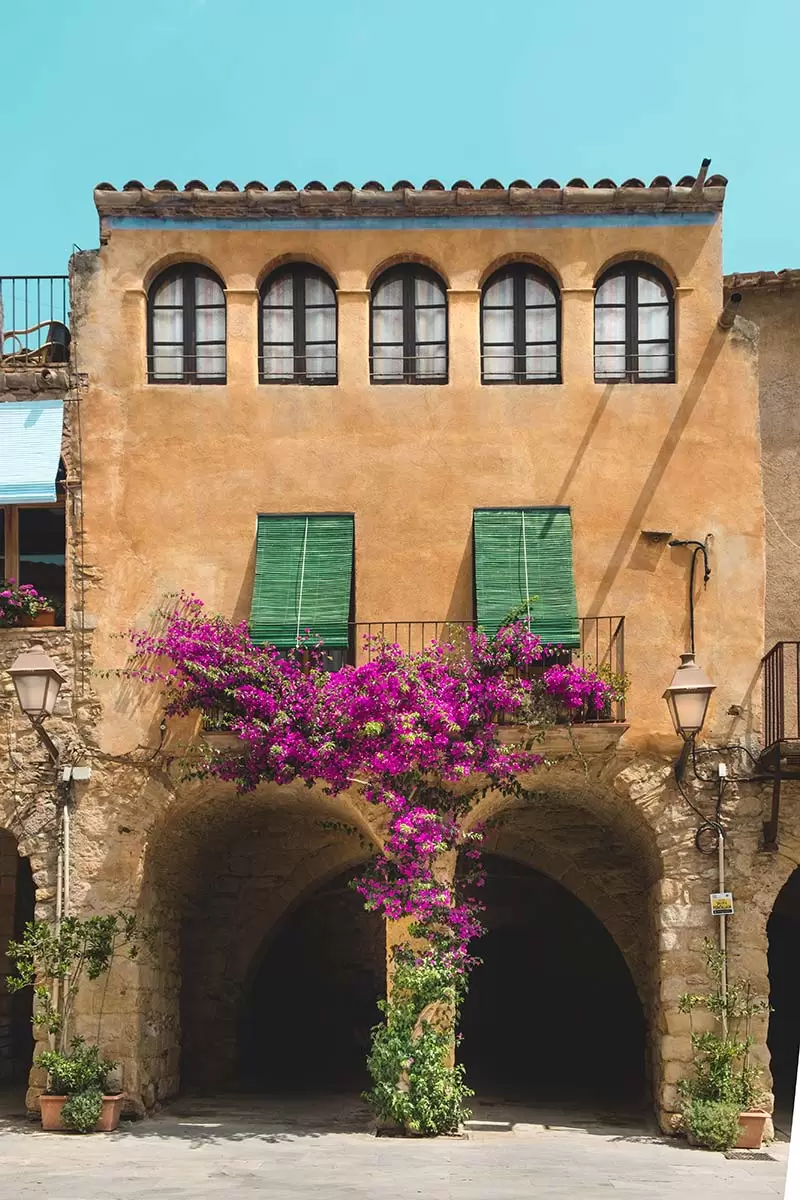 Best things to do in Costa Brava - Peratallada main square with flowers