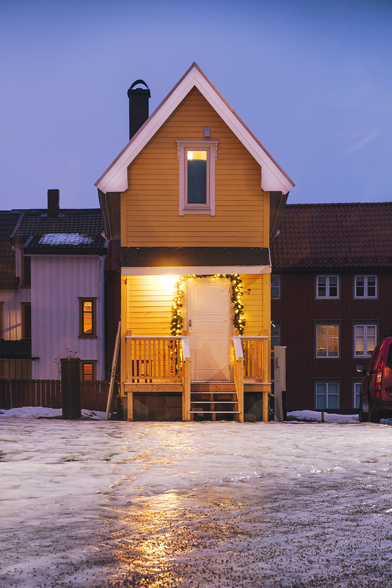 Best Things to do in Tromso in Winter - Cute yellow house