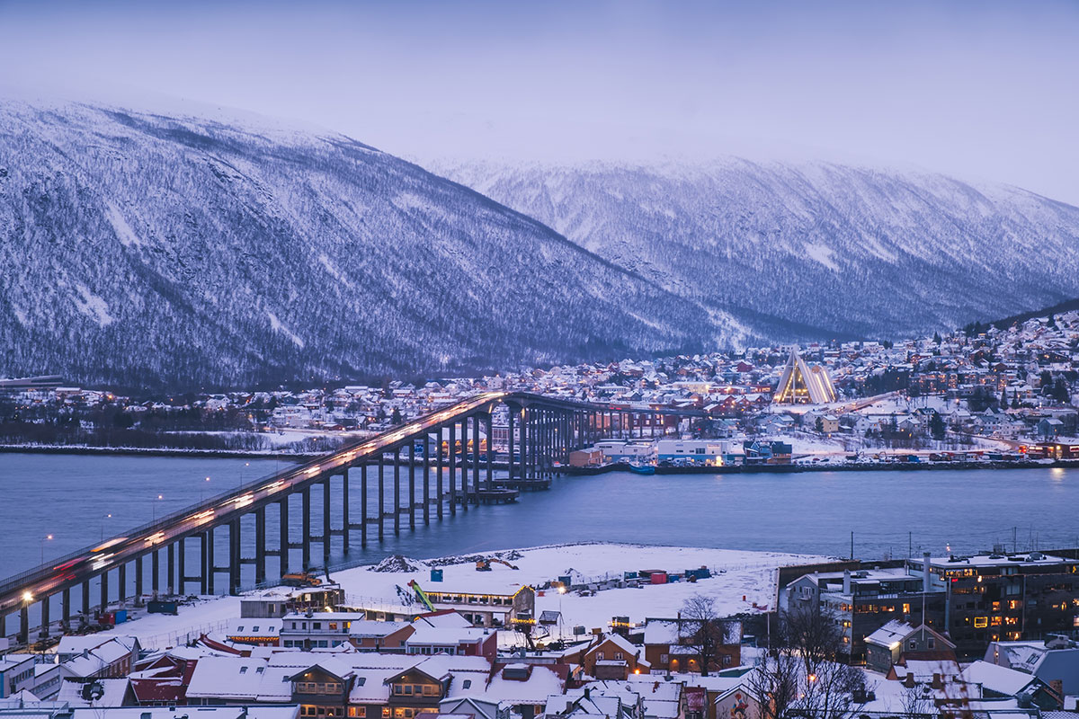 Best Things to do in Tromso in Winter - View of Tromso Bridge and Cathedral