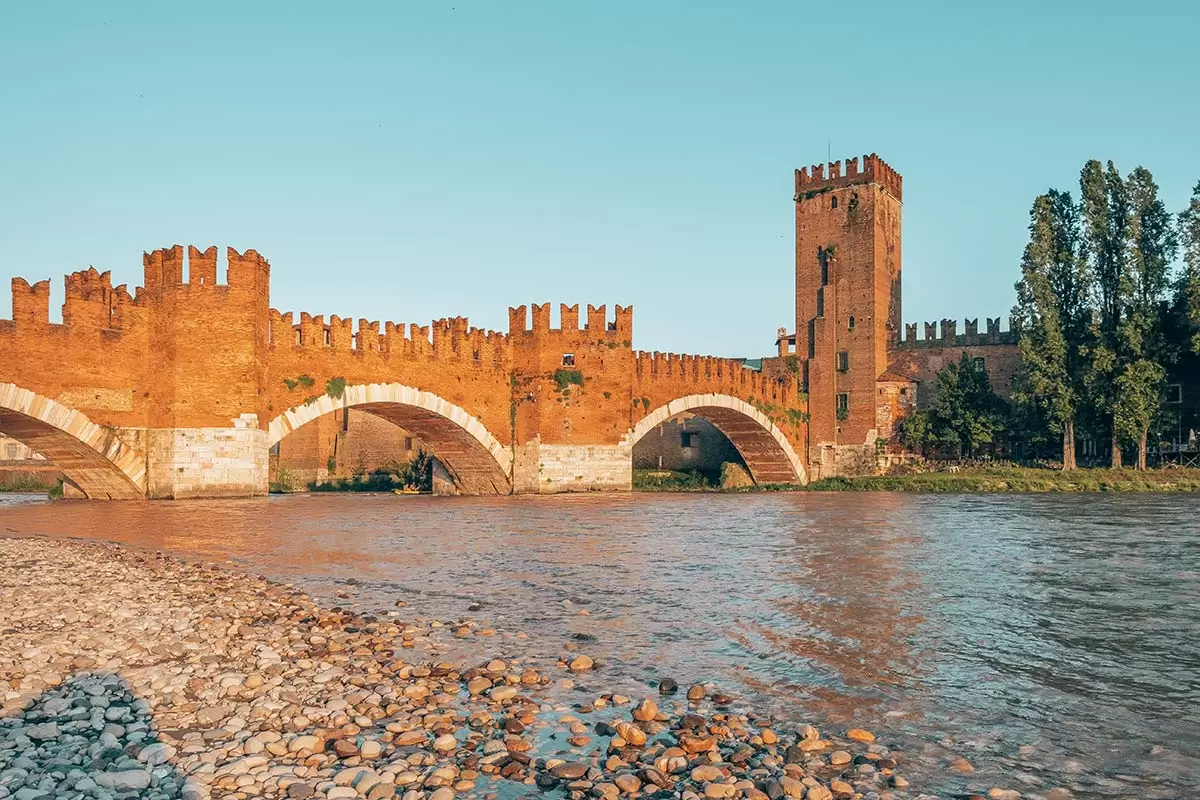 Best Things to do in Verona Italy - Castelvecchio Bridge sunset