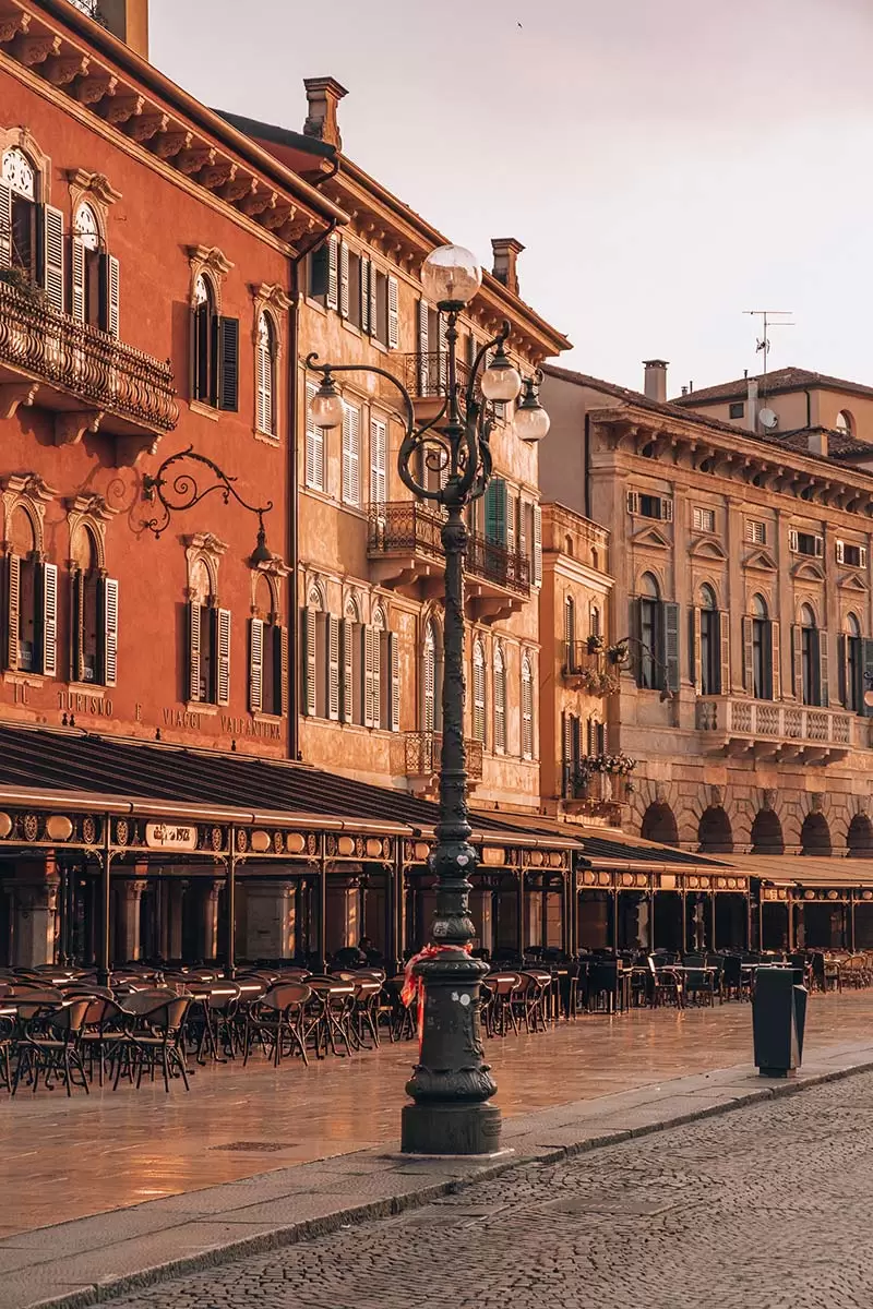 Best Things to do in Verona Italy - Piazza Bra palazzi at sunrise