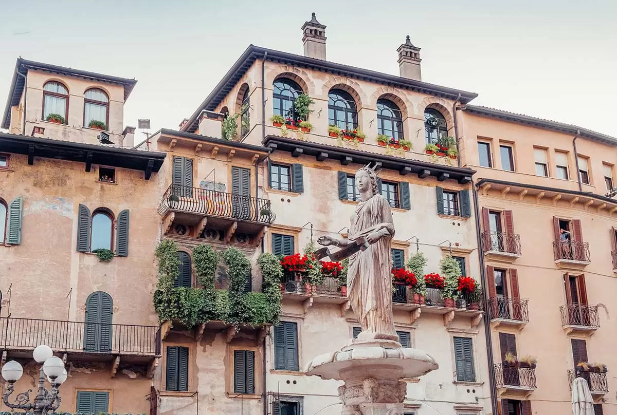 Best Things to do in Verona Italy - Piazza delle Erbe fountain and buildings
