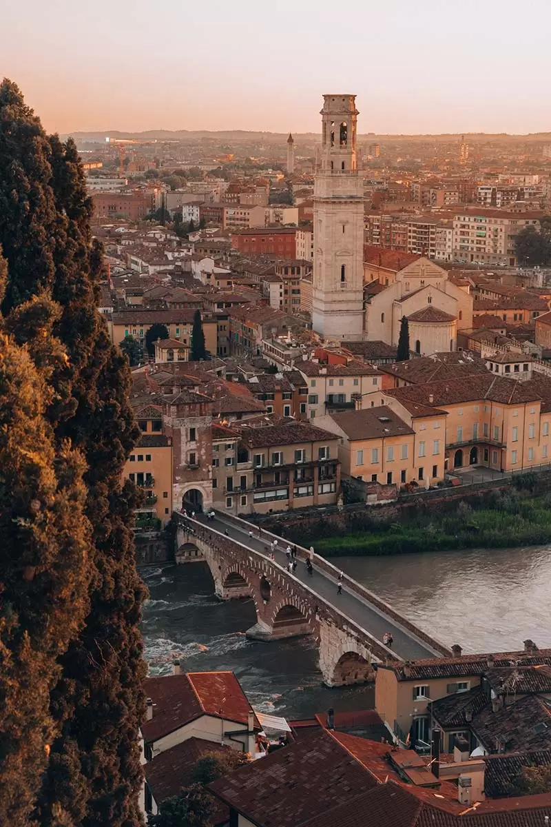 Best Things to do in Verona Italy - View of Ponte Pietra from Castel San Pietro Sunset