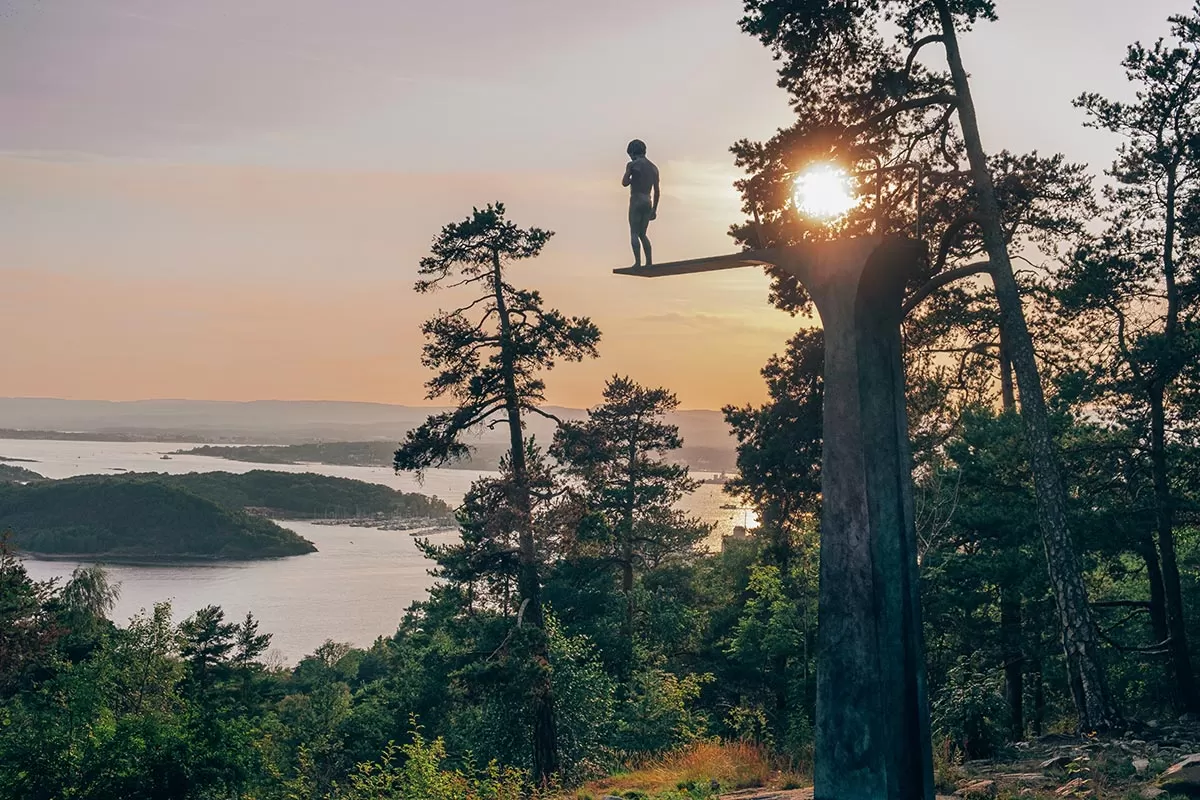 Best things to do in Oslo, Norway - Ekebergparken Sculpture Park - Little boy on diving board 'Dilemma'