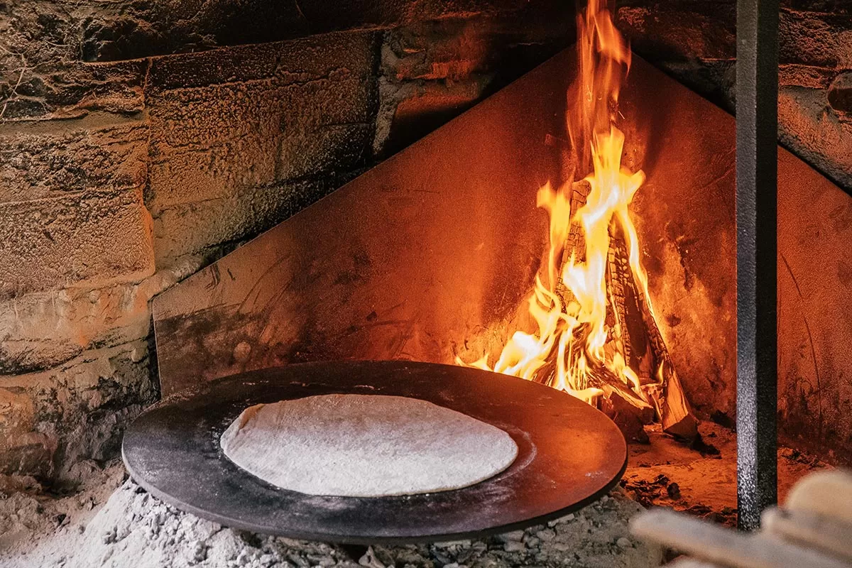 Best things to do in Oslo, Norway - Norsk Folkemuseum making Lefse bread