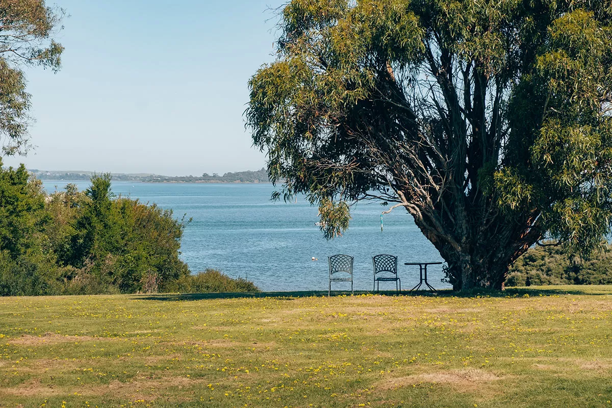 Best things to do in Phillip Island - Table and chairs overlooking Rhyll Inlet