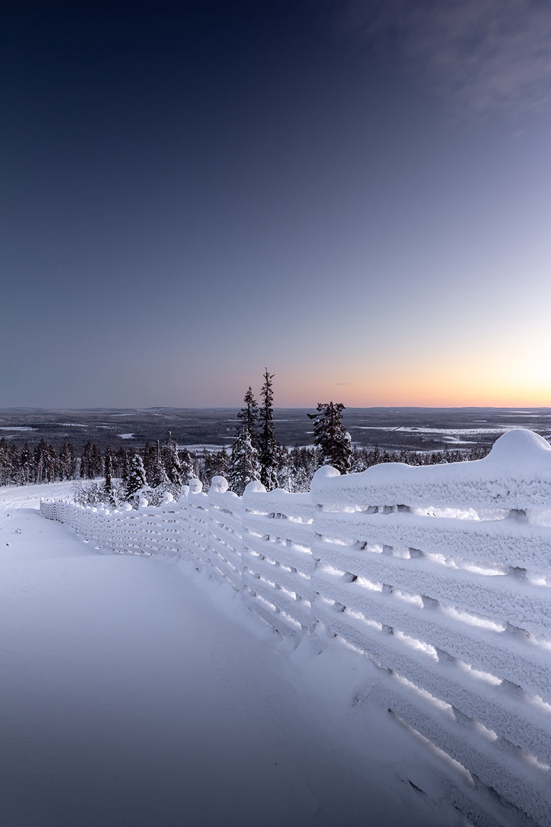 Useful Phrases in Finnish Perfect for Travellers - Snowy fence in Finnish Lapland