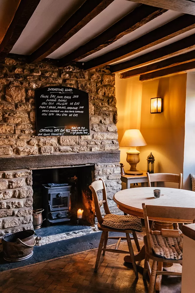 Best Things to Do in Burford - The Cotswolds - Fireplace at The Angel at Burford
