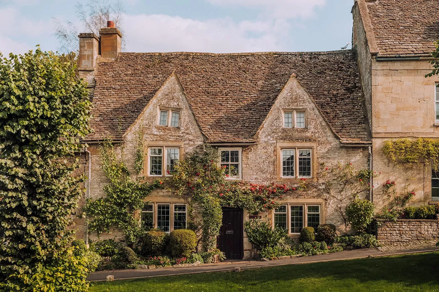 Best Things to Do in Burford - The Cotswolds - Pretty cottage covered in wisteria