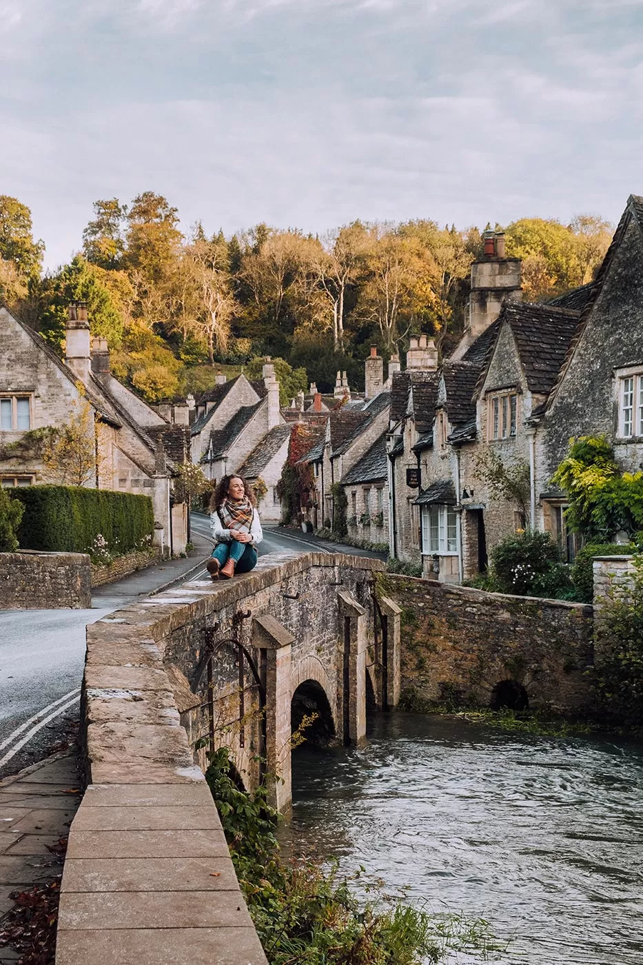 Cotswolds Best Villages - Castle Combe - Sitting on the bridge at Water Lane near weavers cottages