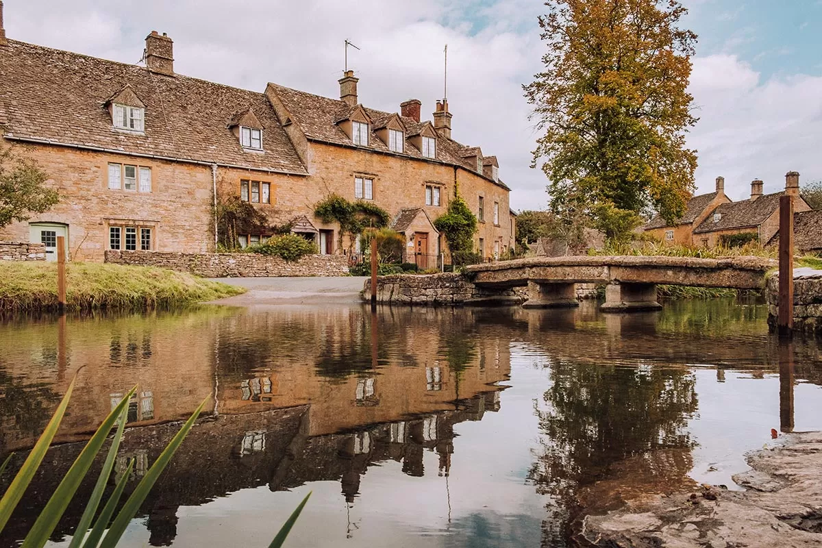 Cotswolds Best Villages - Lower Slaughter - Reflection of cottages in the River Eye