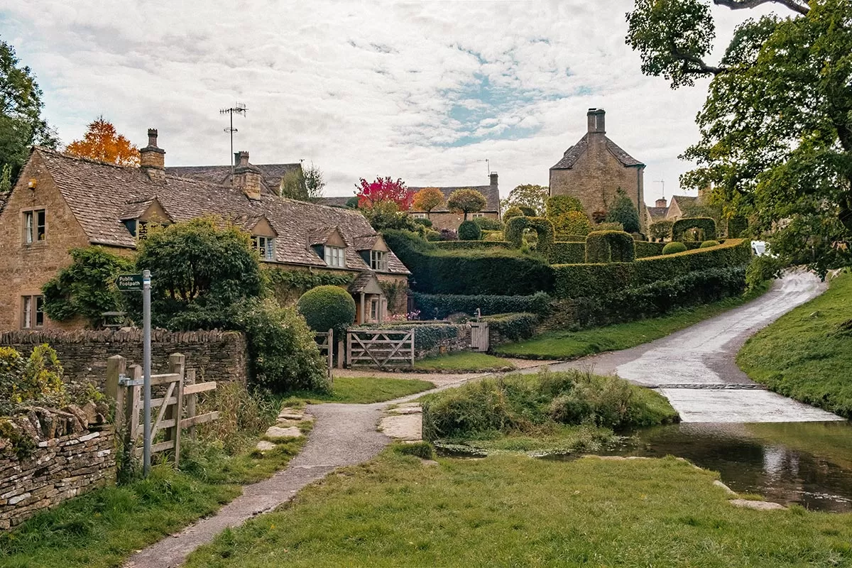 Cotswolds Best Villages - Upper Slaughter - Pretty home and bridge crossing the River Eye