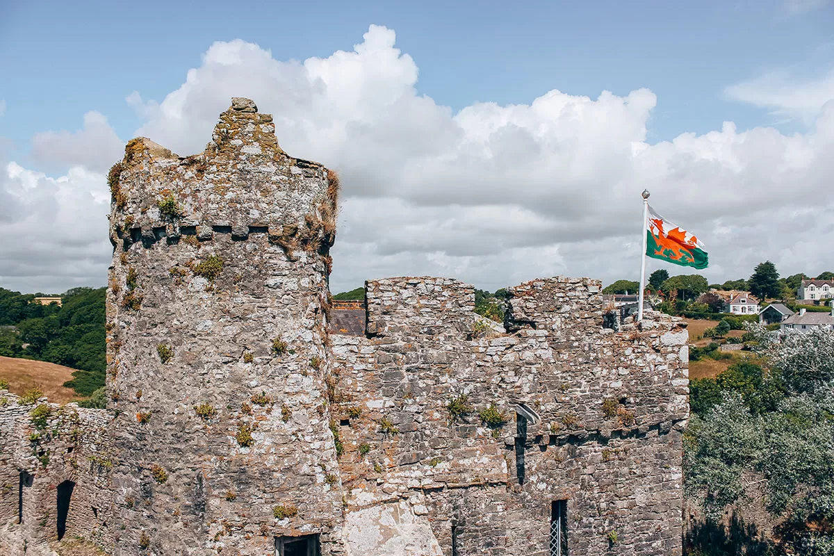 Essential Welsh Phrases for Travel - Castle with Welsh Flag