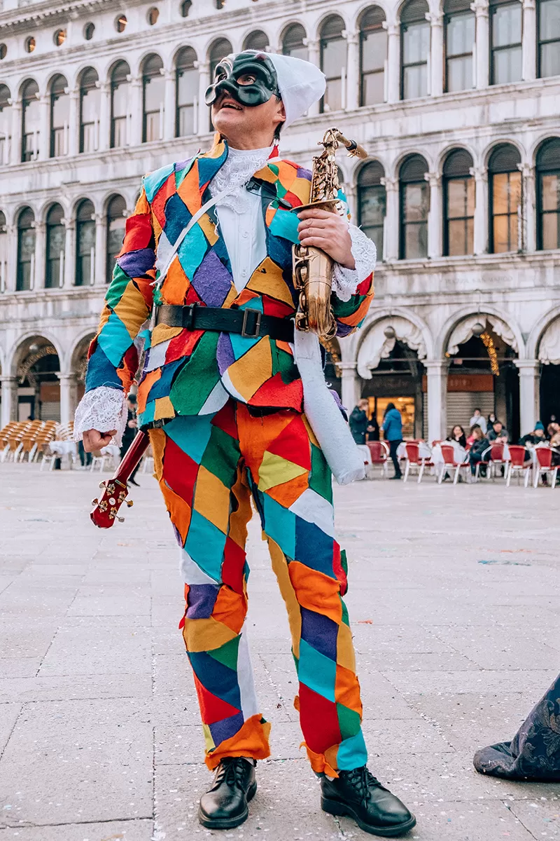Carnival of Venice, Italy - The Ultimate Guide - Arlecchino Harlequin costume from Commedia dell'Arte