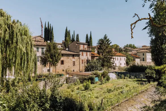 Things to do in Umbria Italy - Houses along river in Bevagna