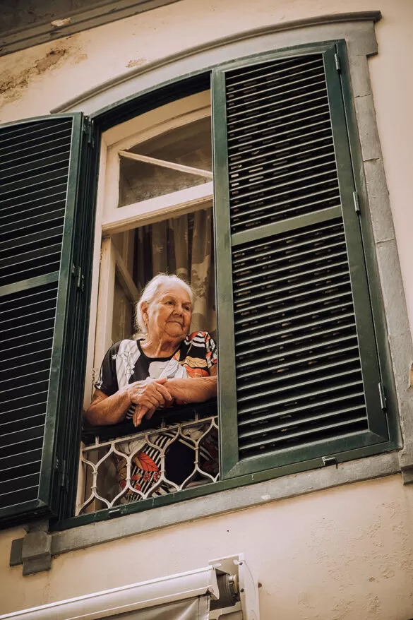 Things to do in Funchal Madeira - Lady looking out window