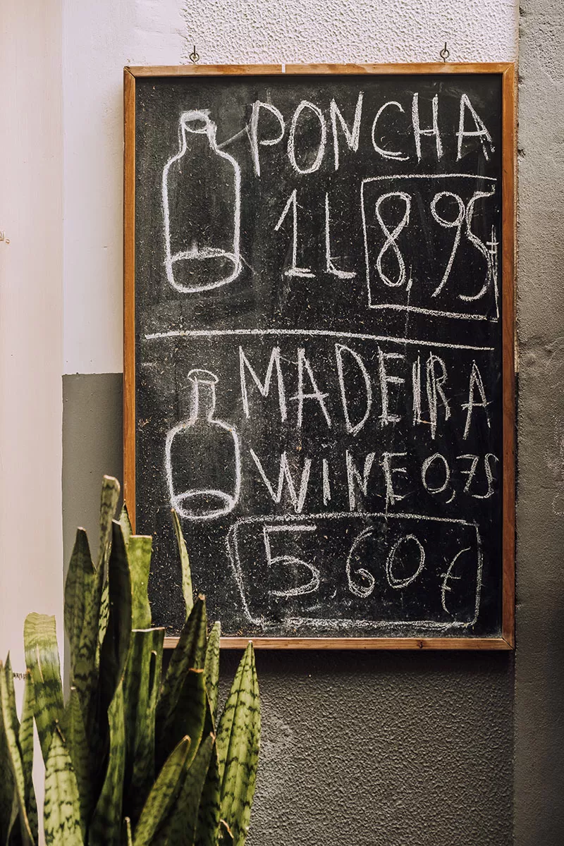 Things to do in Funchal Madeira - Poncha and Madeira wine price board