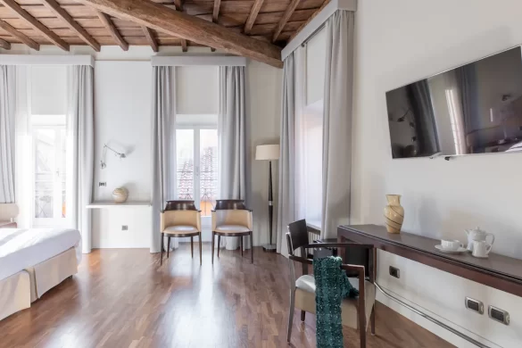 BEST HOTELS Near the Trevi Fountain in Rome - Soft Shading Apartment - Bedroom and TV