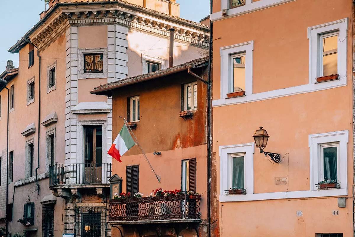 BEST Hotels in Trastevere Rome - Italian flag in Piazza Trilussa