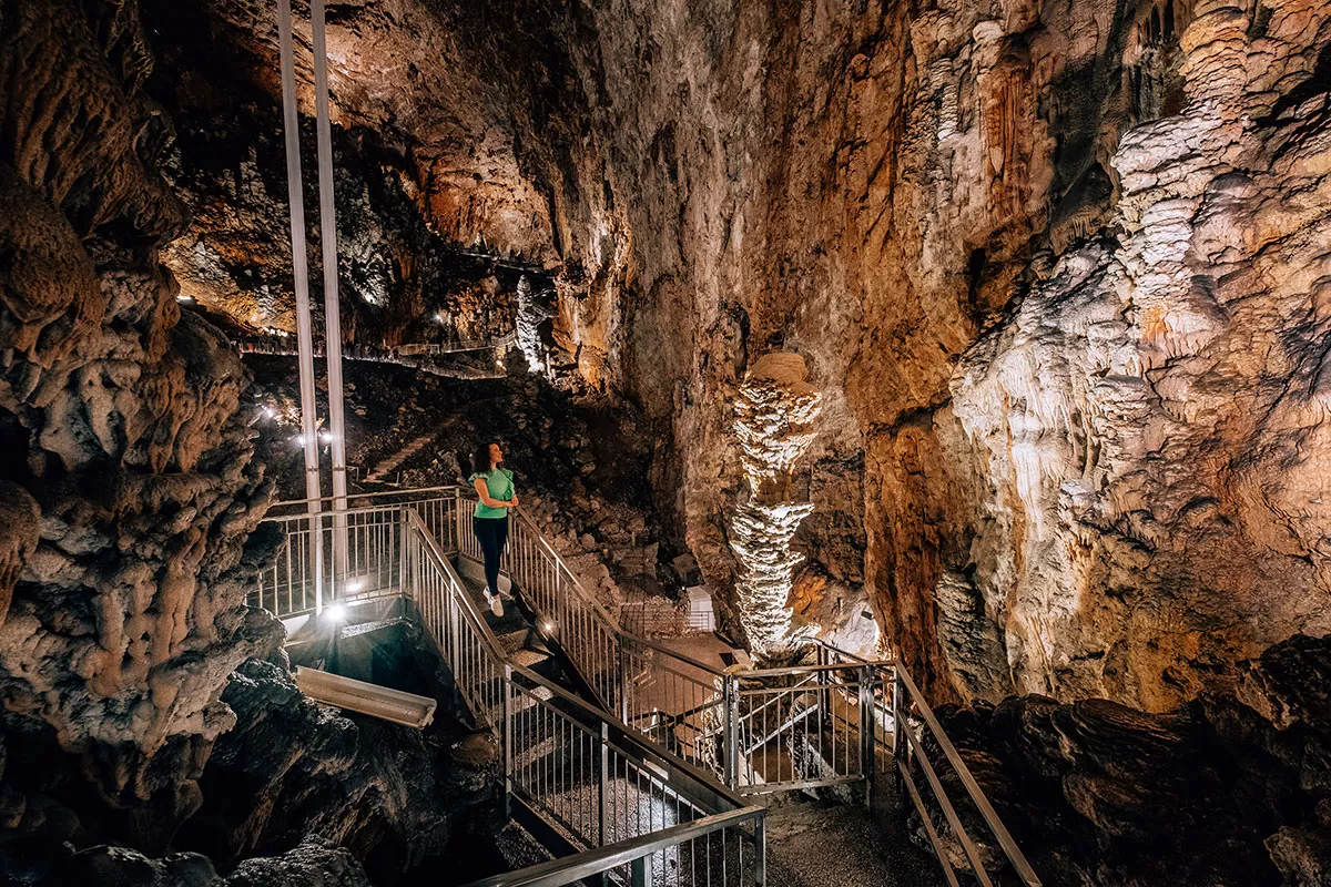 Best Things to Do in Trieste Italy - Grotta Gigante - Michele with stalagmite