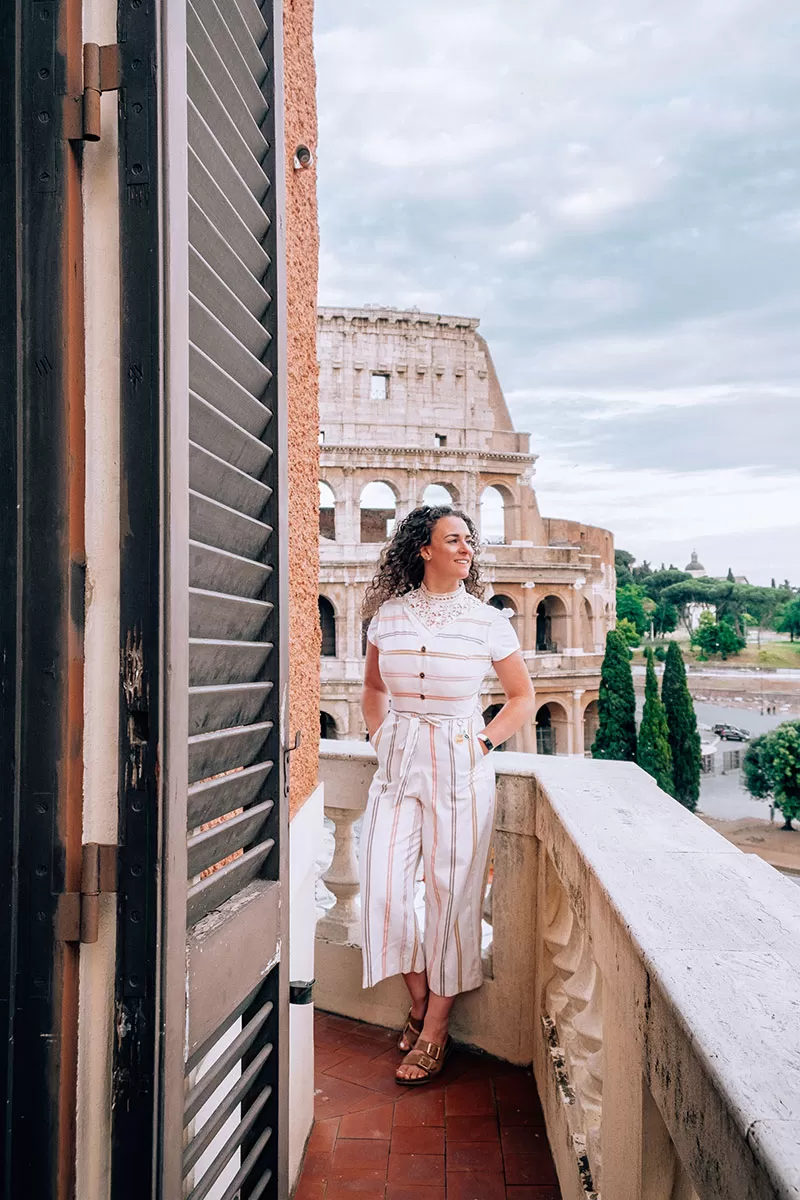 Hotels Near the Colosseum in Rome - Michele on balcony overlooking Colosseum