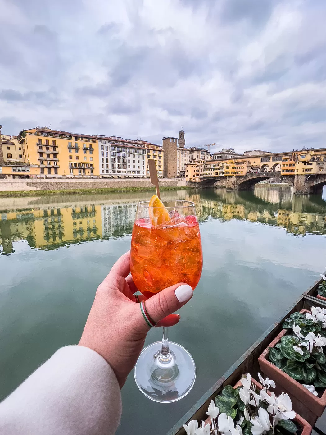 Best Aperitivo in Florence - Picteau - Aperol Spritz overlooking Ponte Vecchio