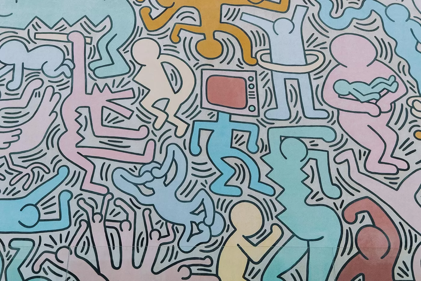 Things to do in Pisa Italy - 'Tuttomondo' Mural by Keith Haring