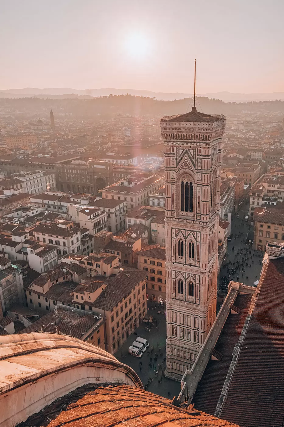 Unique Things to Do in Florence - View from Santa Maria del Fiore of Giotto's Tower at sunset