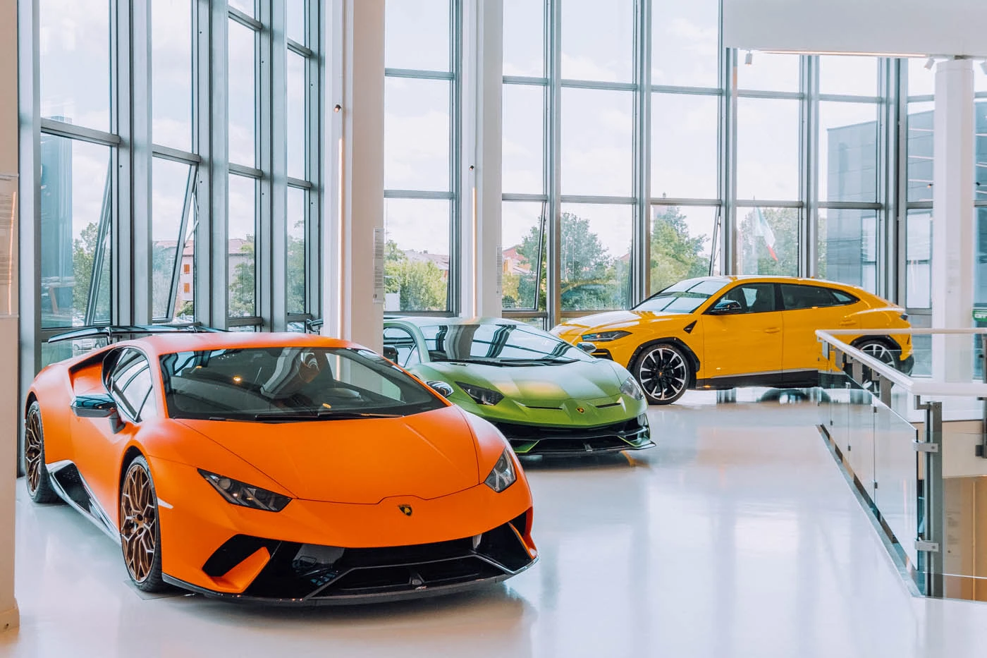 Things to Do in Bologna - Lamborghini Museum Sant’Agata Bolognese - Orange, green and yellow cars