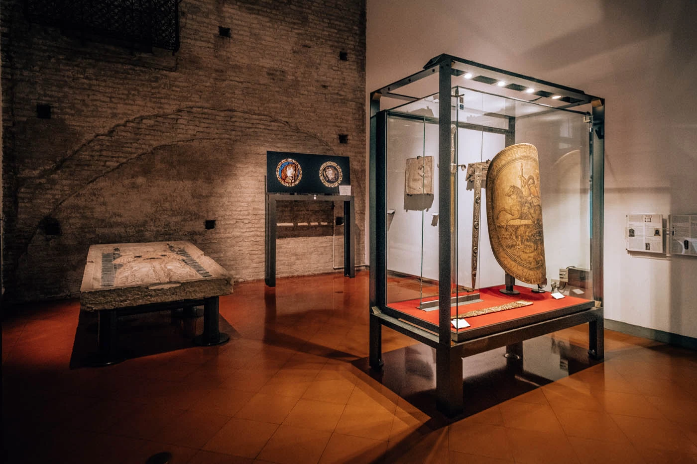 Things to Do in Bologna - Museo Medievale - Shield and tombstone