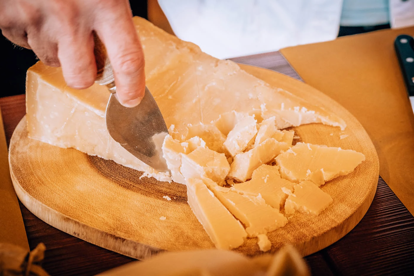 What to Eat in Bologna - Parmigiano Reggiano on chopping board