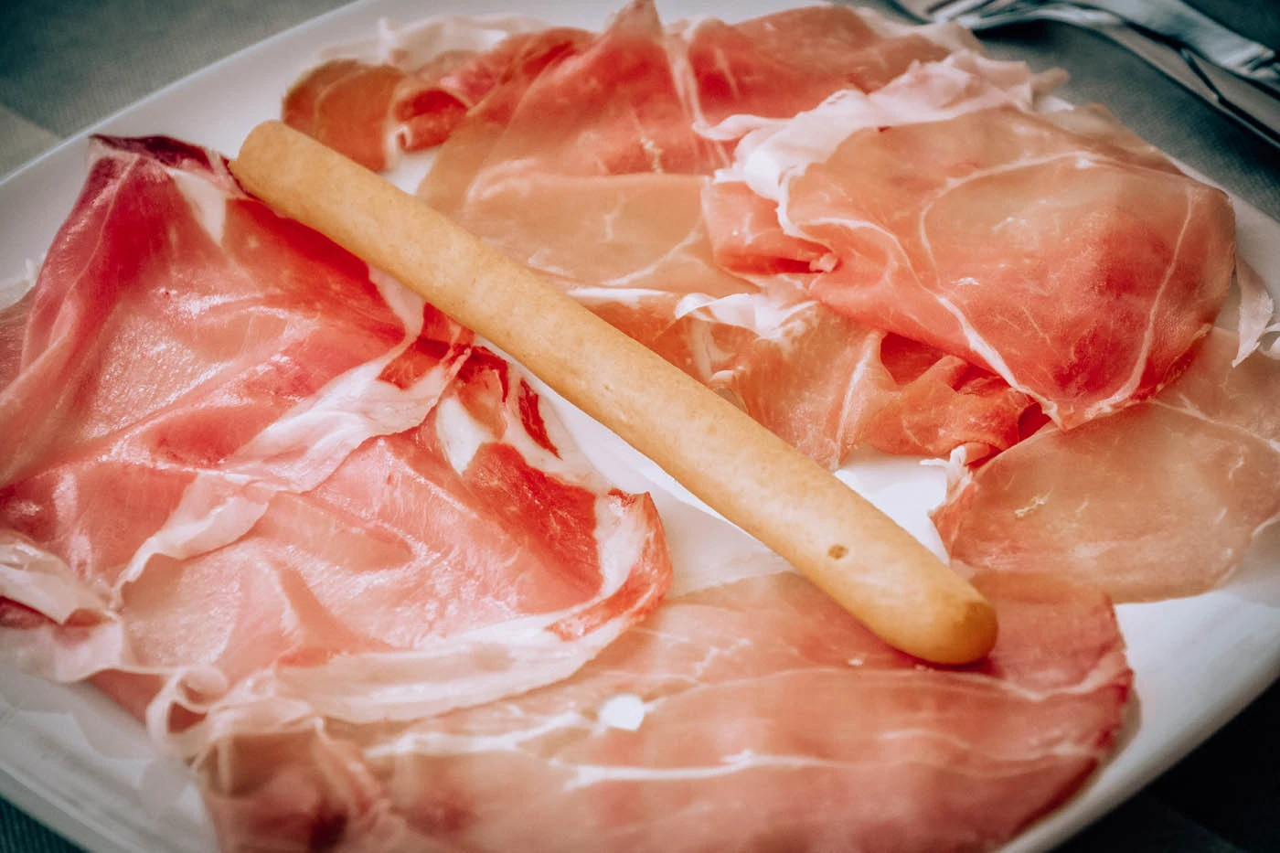 What to Eat in Bologna - Prosciutto Crudo with breadstick